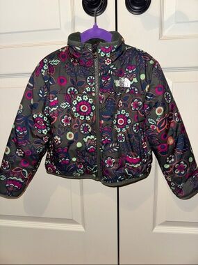 The North Face Kids  Puffer Jacket in forest Green with Pink floral accents